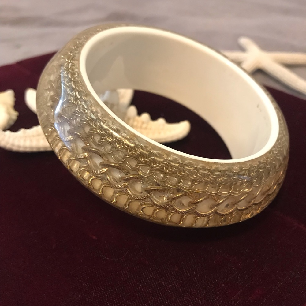 Chunky gold “chains” bracelet.